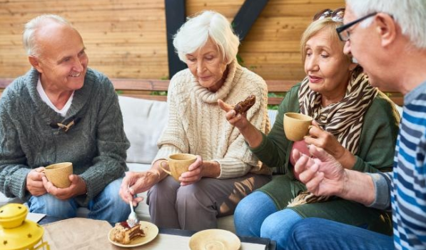 2 couples enjoying coffee